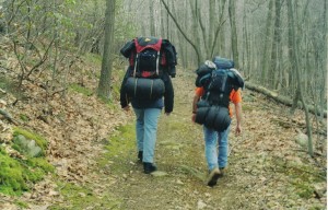 1280px-Hikers_with_packs