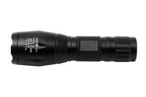 Tactical flashlight on white background